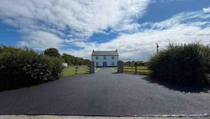 New SMA tarmac driveway with a new paving border completed in Kildare Town by Kildare Tarmac & Asphalt.